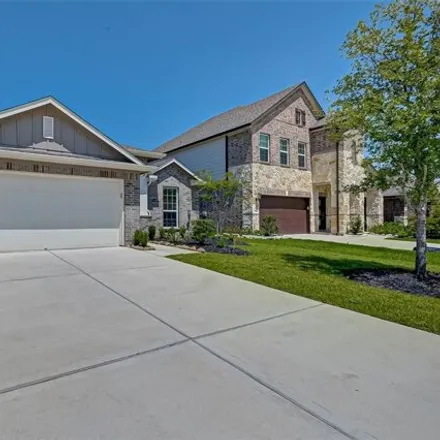 Rent this 4 bed house on 4411 Upland Stream Ln in Katy, Texas