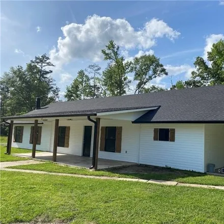 Rent this 4 bed house on 11101 Soape Road in Tangipahoa Parish, LA 70403
