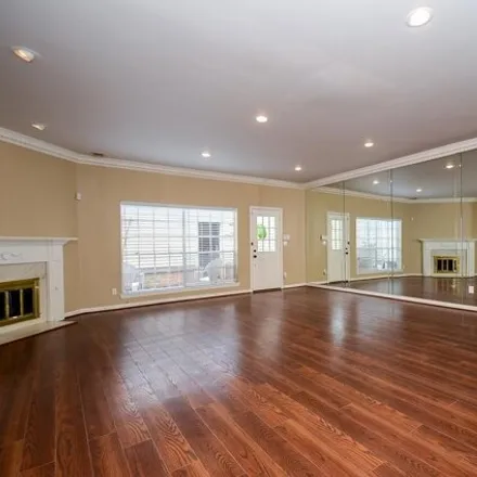 Rent this 3 bed townhouse on 575 North Post Oak Lane in Houston, TX 77024