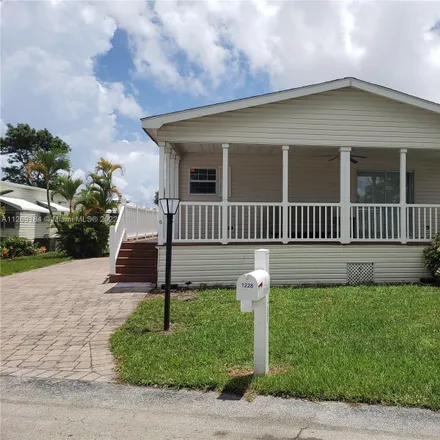 Rent this 2 bed house on 7062 42nd Way North in Palm Beach County, FL 33404