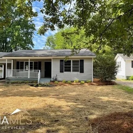 Rent this 3 bed house on 113 5th Ave in Jonesboro, Georgia