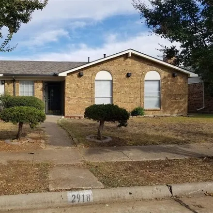 Rent this 3 bed house on 2964 Green Meadow Drive in Garland, TX 75044
