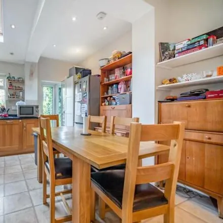 Rent this 3 bed room on Stuart Road in London, SW19 8BX