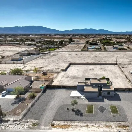 Buy this 2 bed house on 3140 Oakleaf Avenue in Pahrump, NV 89048