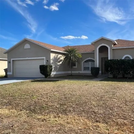 Rent this 4 bed house on 28 Alicante Court in Poinciana, FL 34758