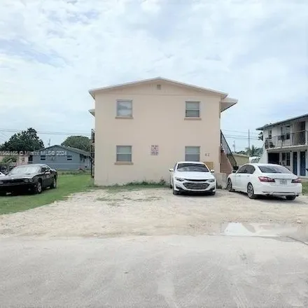 Rent this 2 bed house on 670 Southwest 4th Street in Belle Glade, FL 33430