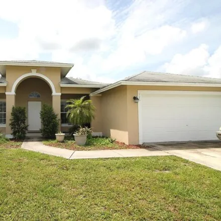 Rent this 3 bed house on 928 Southwest Hamberland Avenue in Port Saint Lucie, FL 34953