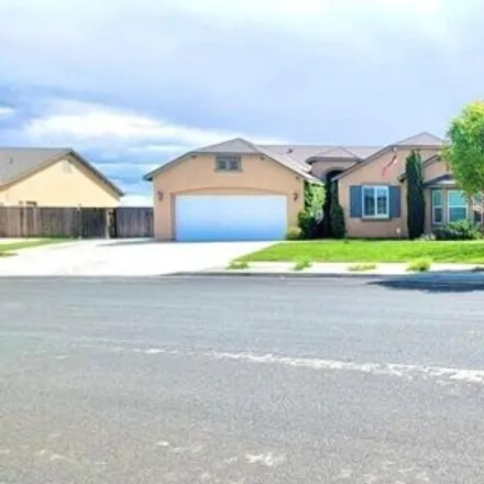 Buy this 4 bed house on 1019 Geneva Drive in Lemoore, CA 93245