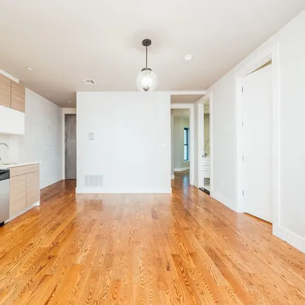 Rent this 4 bed apartment on 102 Rogers Avenue in New York, NY 11216