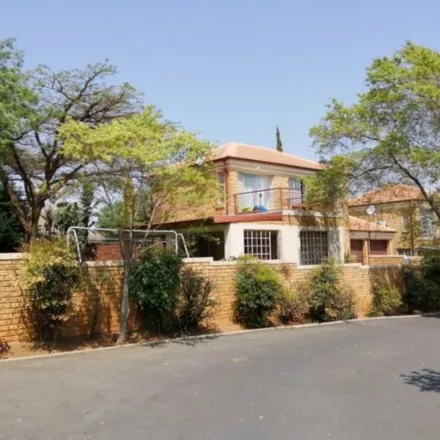 Rent this 3 bed townhouse on Dubloon Avenue in Wilgeheuwel, Roodepoort