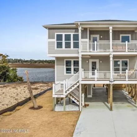 Buy this 4 bed house on 4970 West Beach Drive in Oak Island, Brunswick County