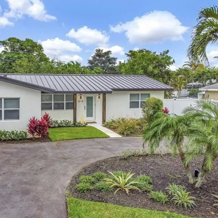 Buy this 4 bed house on 2290 Canal Drive in Chapel Hill, Boynton Beach