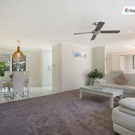 Rent this 4 bed apartment on Caningeraba State School in Whistler Drive, Burleigh Waters QLD 4220