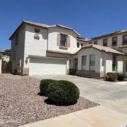 Rent this 4 bed house on 13644 West Calavar Road in Surprise, AZ 85379