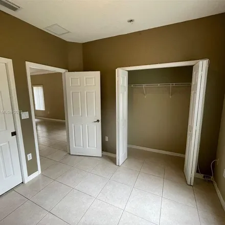 Rent this 4 bed apartment on 8301 Northwest 107th Court in Doral, FL 33178