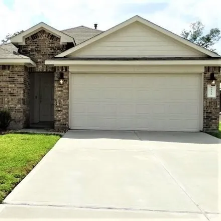 Rent this 4 bed house on 14064 Crystal Cave Ln in Conroe, Texas