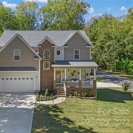 Buy this 4 bed house on 6821 Loretta Place in Charlotte, NC 28215