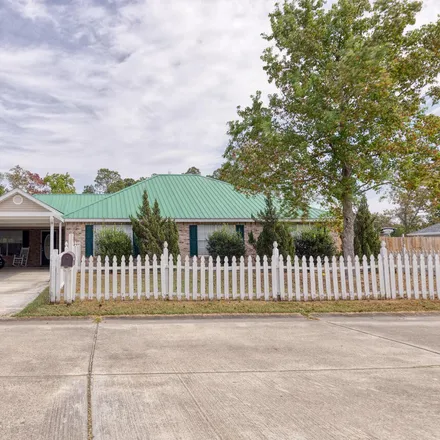 Buy this 4 bed house on 806 Kyle Circle in Waveland, MS 39576