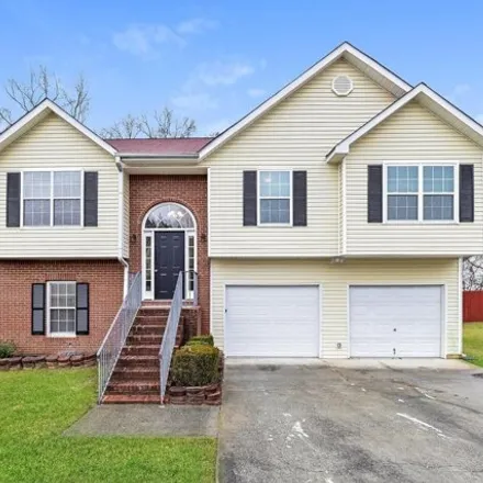 Rent this 4 bed house on 1553 Blossom Drive in Clayton County, GA 30349