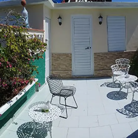 Rent this 7 bed house on Colón