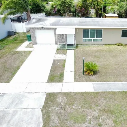 Buy this 3 bed house on 129 Southeast Lucero Drive in Port Saint Lucie, FL 34983