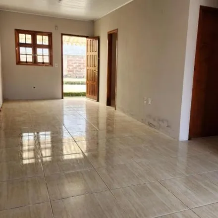 Rent this 3 bed house on Rua Corujas in Algarve, Alvorada - RS