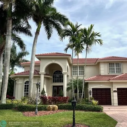 Buy this 5 bed house on 6143 Northwest 120th Terrace in Heron Bay South, Coral Springs