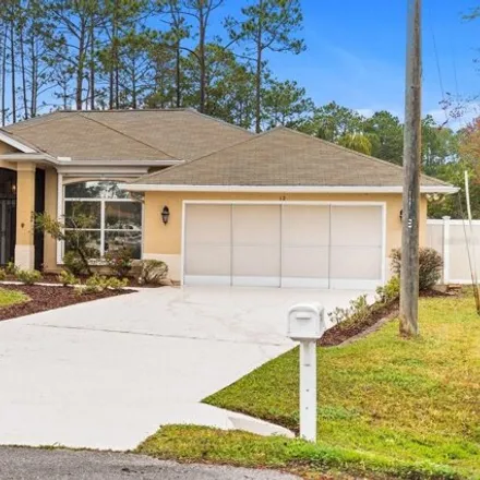 Buy this 3 bed house on 99 Ethan Place in Palm Coast, FL 32164