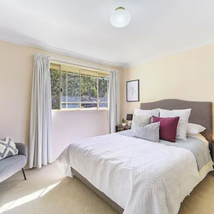 Rent this 4 bed apartment on 152 Woodbury Park Drive in Mardi NSW 2259, Australia