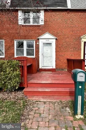 Rent this 3 bed townhouse on 207 Madison Drive in Studio Green, Newark