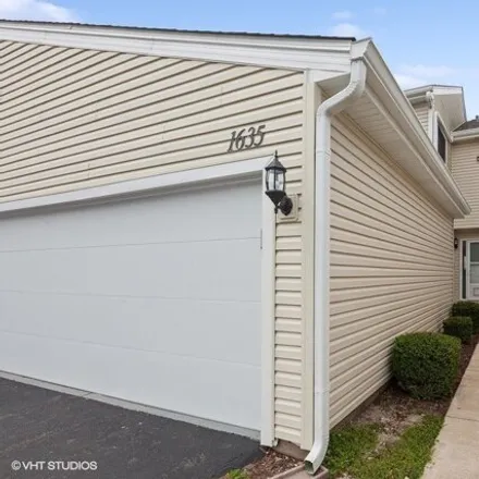 Buy this 3 bed townhouse on 1663 Mulligan Drive in Naperville, IL 60563