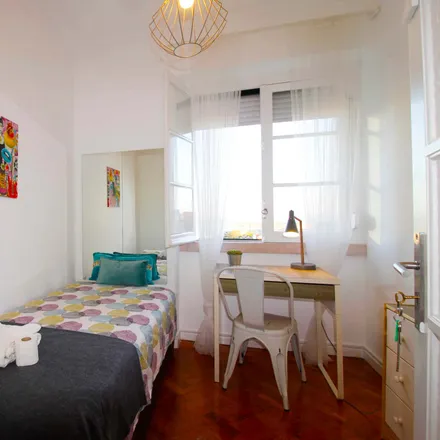 Rent this 6 bed room on Rua Leite de Vasconcelos 77 in 1170-379 Lisbon, Portugal