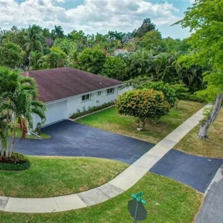 Buy this 4 bed house on 6324 Southwest 1st Street in Plantation, FL 33317