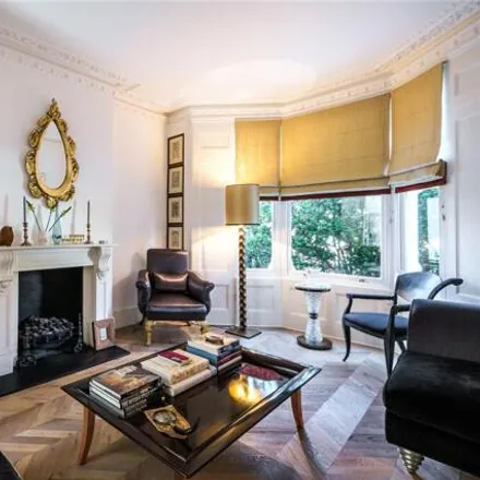 Buy this 4 bed townhouse on Barton House Health Centre in Albion Road, London