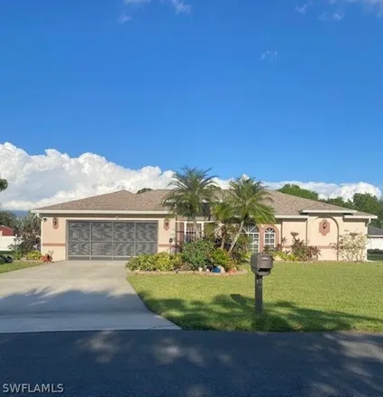 Rent this 3 bed house on 1600 Cheshire Circle North in Lehigh Acres, FL 33936