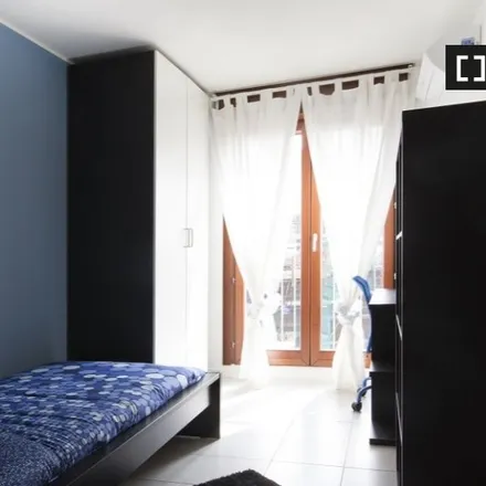 Rent this 8 bed room on Via Luigi Scrosati 9 in 20146 Milan MI, Italy