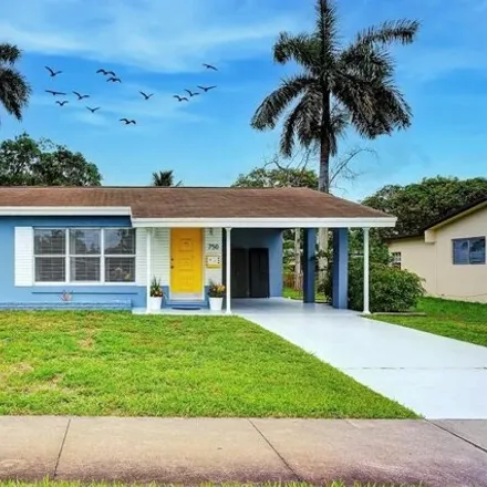 Buy this 3 bed house on 750 NW 38th St in Oakland Park, Florida