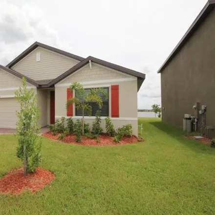 Rent this 4 bed house on unnamed road in Palm Bay, FL