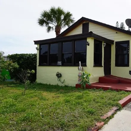 Buy this 3 bed house on 1377 West 26th Court in Riviera Beach, FL 33404