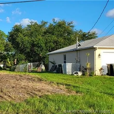 Buy this studio house on 2405 Southwest Halisse Street in Port Saint Lucie, FL 34953