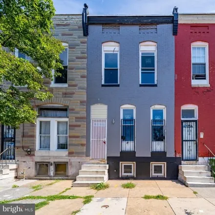Buy this 3 bed house on 713 North Payson Street in Baltimore, MD 21217
