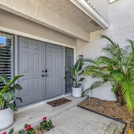 Rent this 4 bed apartment on 11839 Pebblewood Drive in Wellington, FL 33414