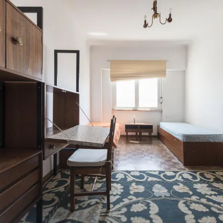 Rent this 3 bed room on Rua Doutor José Baptista de Sousa 9 in 1500-244 Lisbon, Portugal