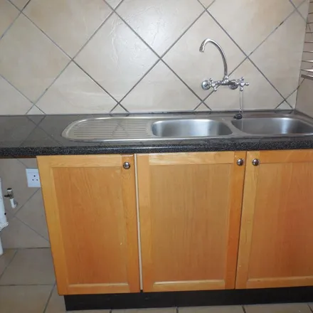 Rent this 4 bed townhouse on Dorking Road in Lynnwood Manor, Pretoria