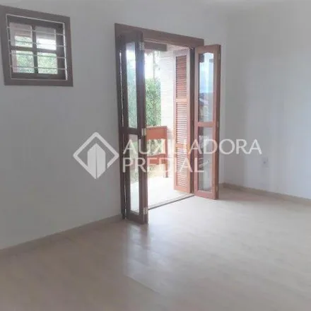 Buy this 3 bed house on Rua Itacyr Rossi in Guarujá, Porto Alegre - RS