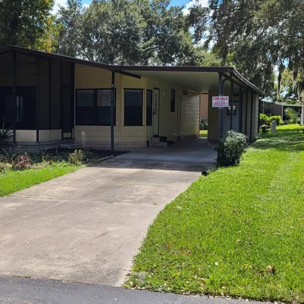 Buy this 2 bed house on 10954 Whispering Oaks Circle in Riverview, FL 33569