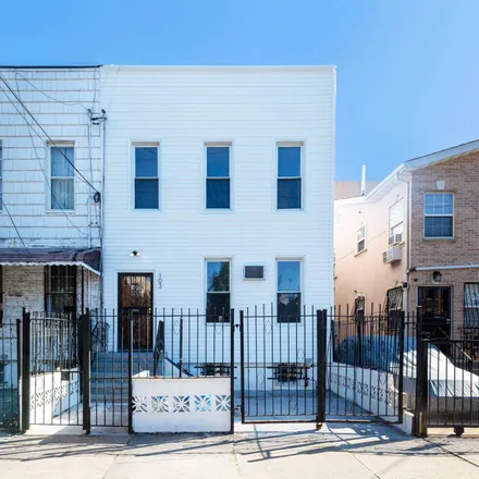 Buy this 4 bed townhouse on 103 Hemlock Street in New York, NY 11208
