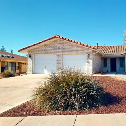 Buy this 3 bed house on Desert Lakes Golf Course in 2351 Hamilton Road, Alamogordo