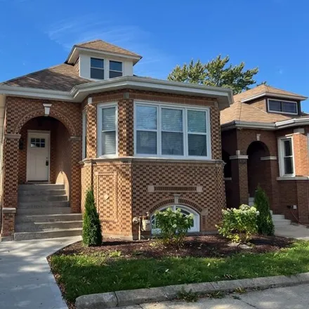 Buy this 4 bed house on 8722 South Marshfield Avenue in Chicago, IL 60620