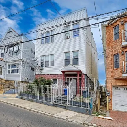 Buy this 7 bed house on 20 Graham Street in Jersey City, NJ 07307